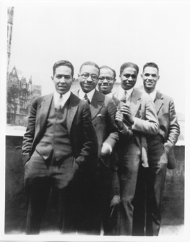 Langston Hughes with others overlooking St. Nicholas Avenue.